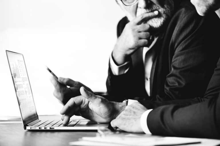 businessmen-using-computer-laptop_53876-14772.jpg